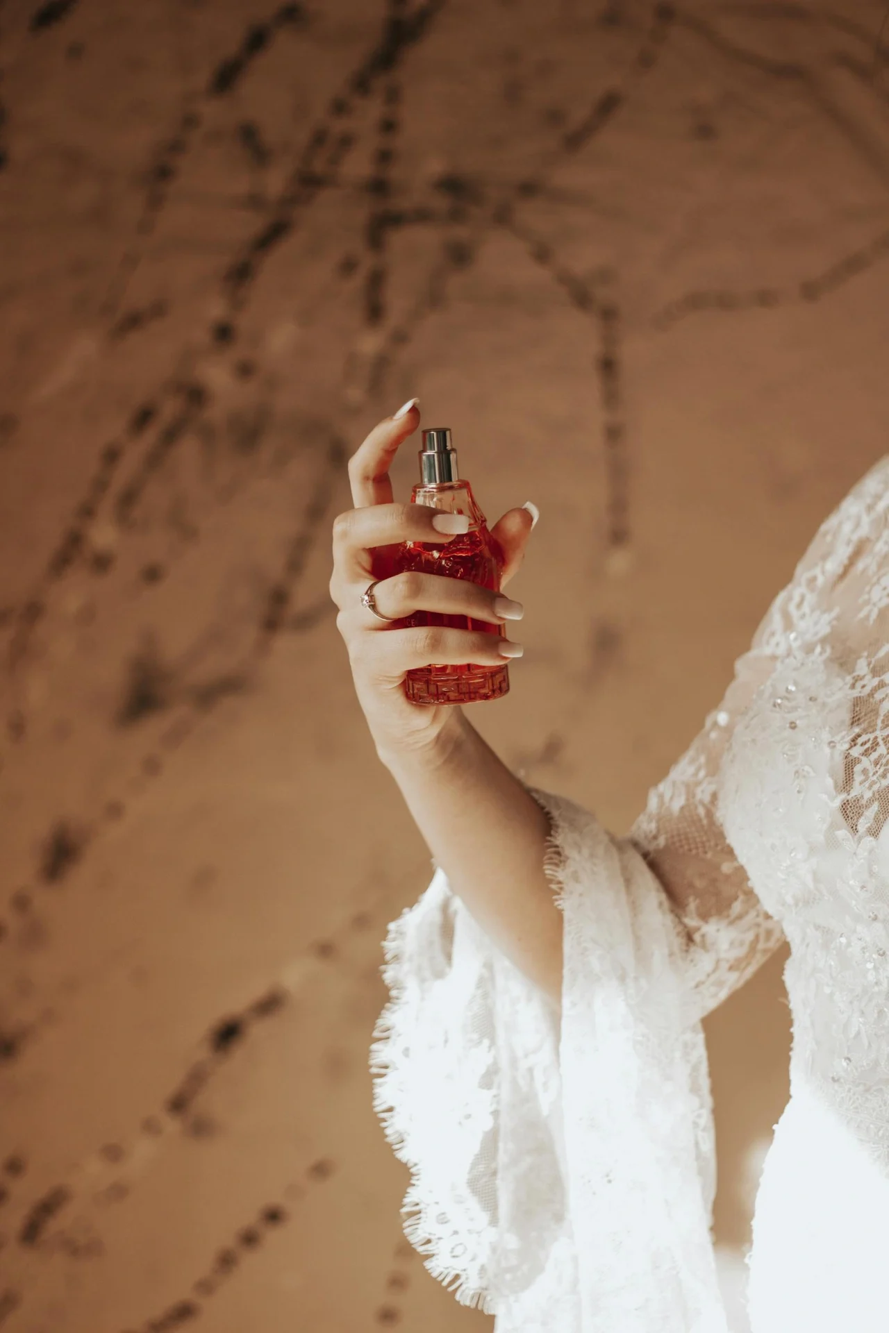 RangeKhushboo - bride applying perfume 11592720 scaled 1